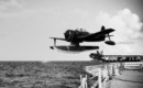 A U.S. Navy Curtiss SC 1 Seahawk is catapulted off the battleship USS Iowa.