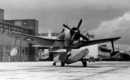 A U.S. Navy Curtiss SC 1 Seahawk sea plane on the sea wall at Naval Air Station Jacksonville Florida. 1946