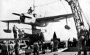 A U.S. Navy Curtiss SO3C Seamew on a catapult of the light cruiser USS Columbia .